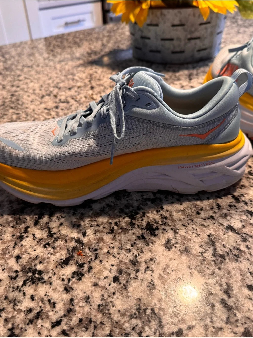 Hoka Bondi 8 Women’s Light Blue Shoe with Yellow Midsole